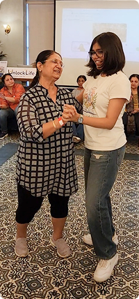 Two people talking and laughing