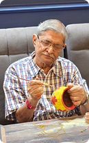 Person holding a yellow object